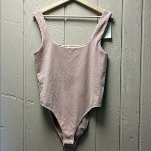 A new day bodysuit NWT